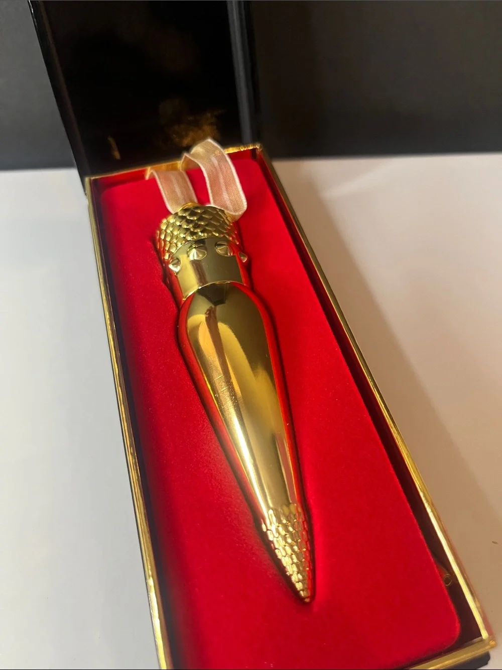 Christian Louboutin Gold Bullet Lipstick in Bright Coral Pink